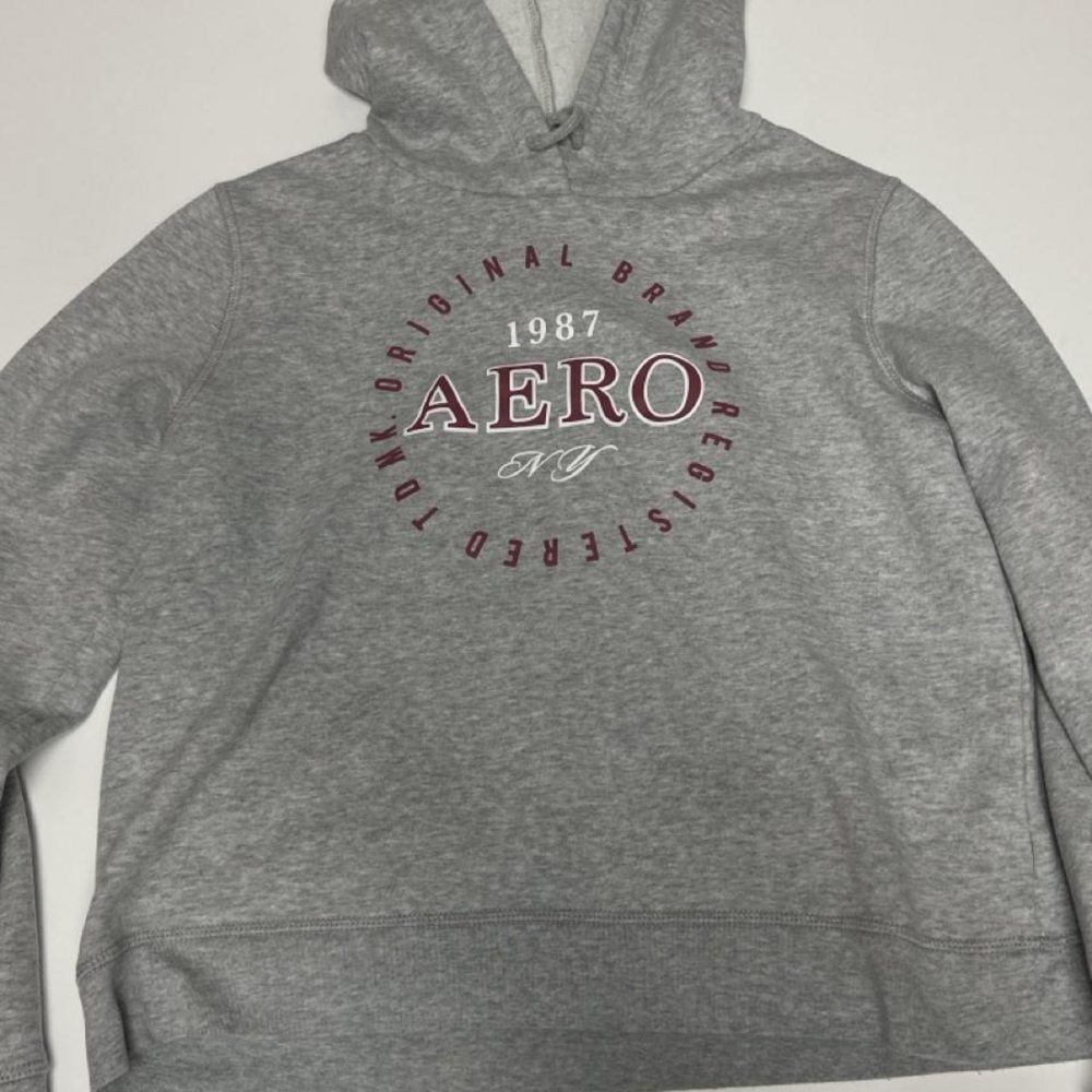 Gray Aeropostale hoodie with red circular logo featuring 'AERO' and '1987' text,